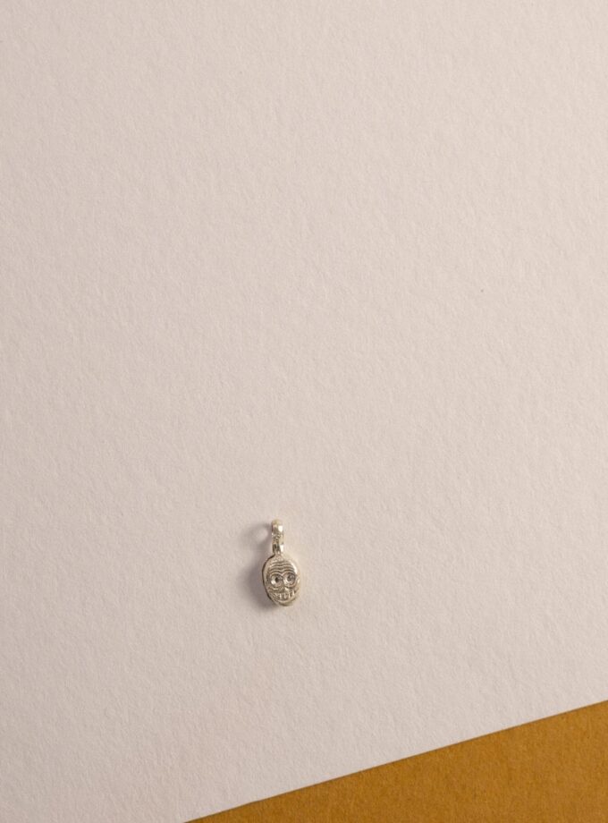 Marcador de plata de calavera