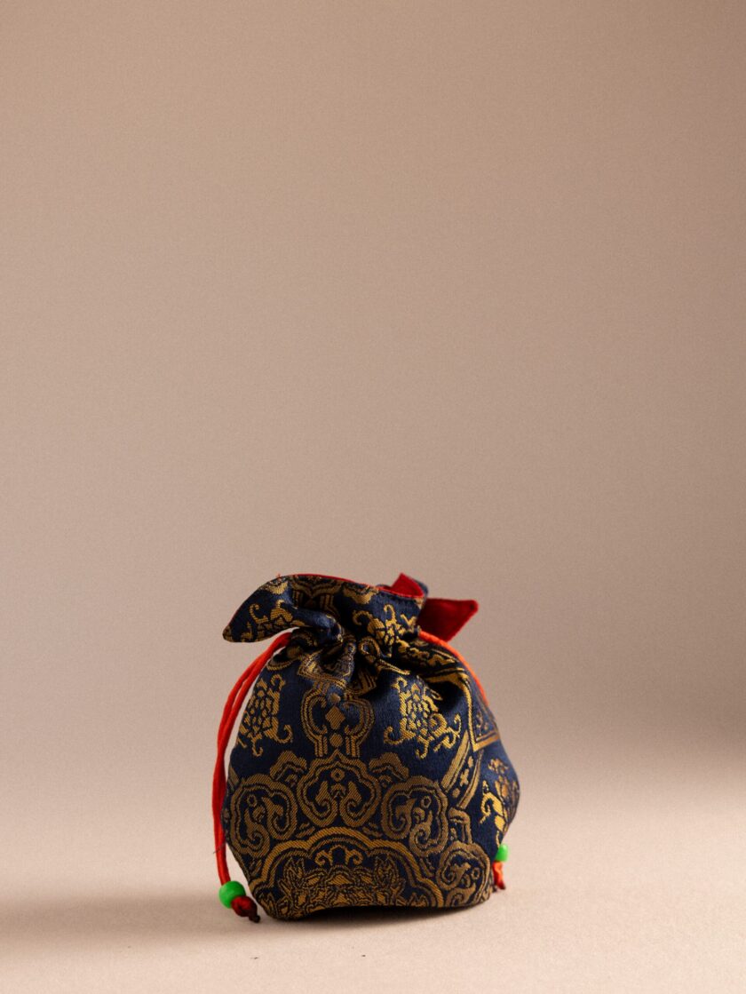 Bolsa de mala Azul y Dorado